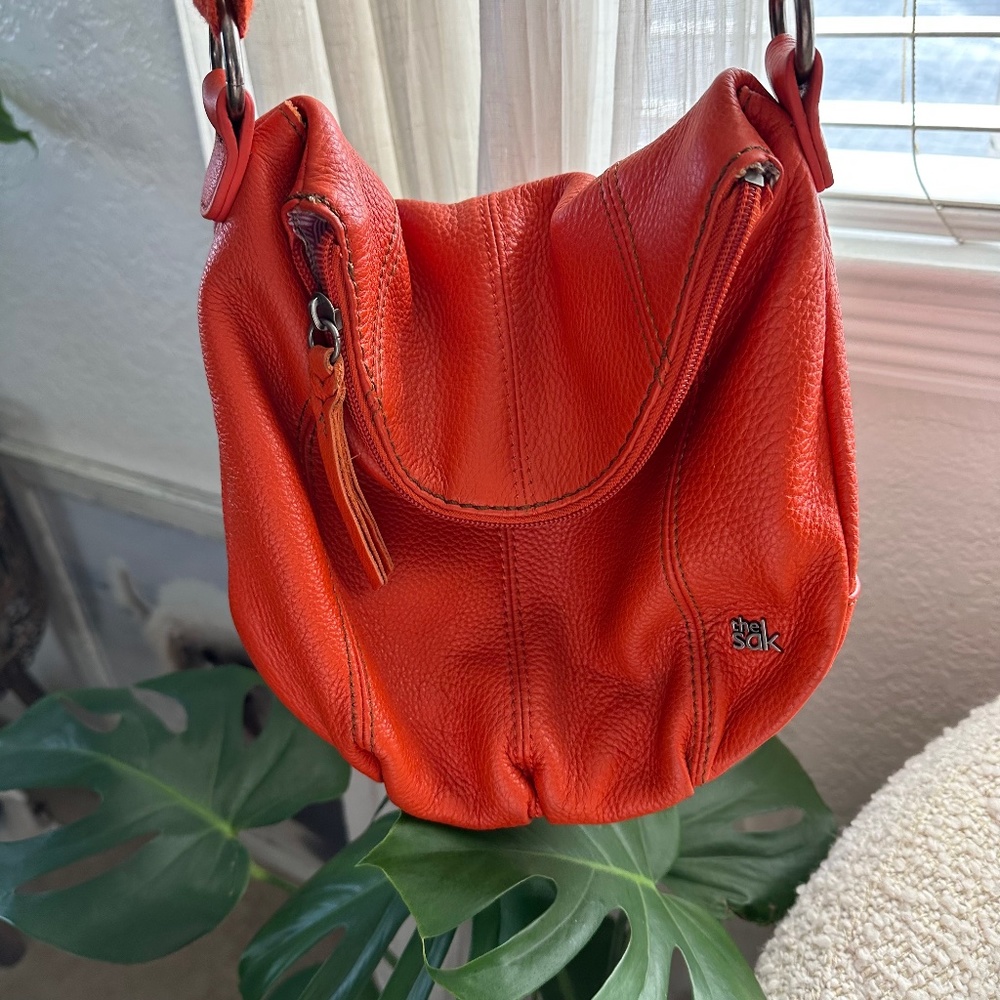 The Sak Orange Cross Body Bag